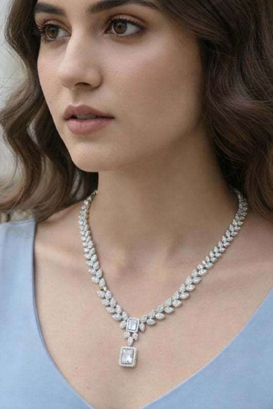 Contemporary Silver-Finish Marquise Leaf Necklace Set with Radiant Stone-Studded Drop Earrings