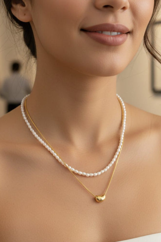 Elegant Dual-Layered Pearl & Gold-Tone Bean Pendant Necklace