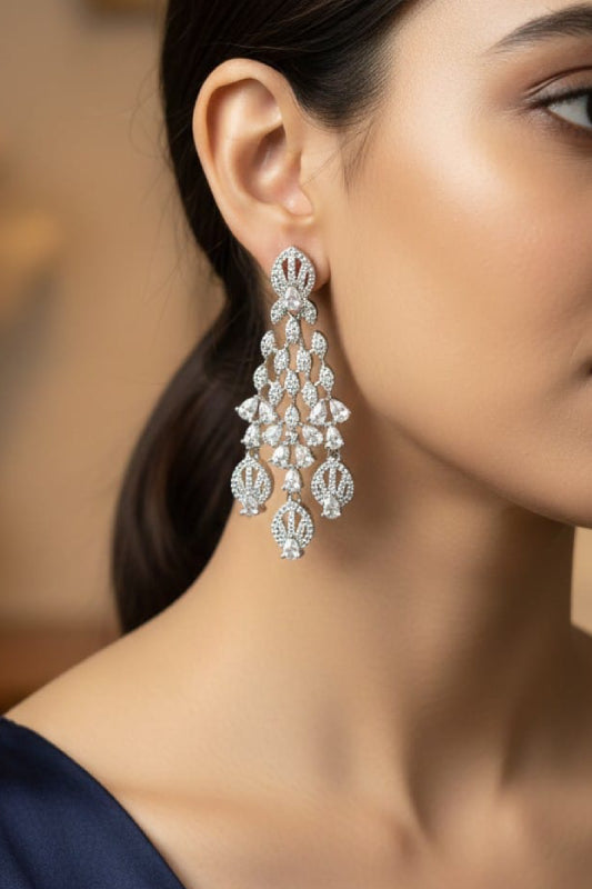 Elegant Silver-Finish Chandelier Earrings with Shimmering Stone Accents