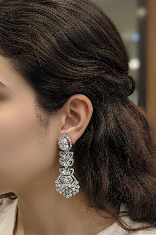 Ornate Silver-Finish Floral Chandelier Earrings with Pear-Cut Crystal Accents